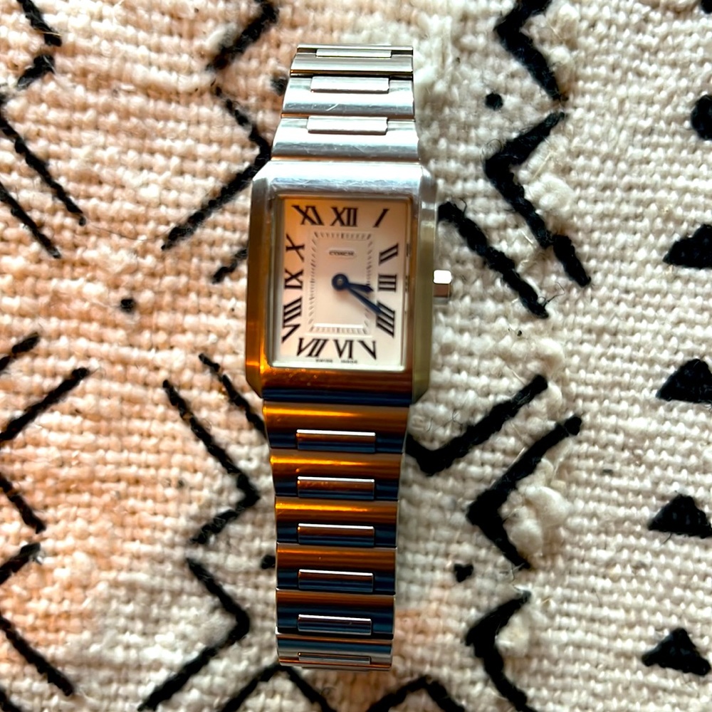 Coach stainless steel watch.